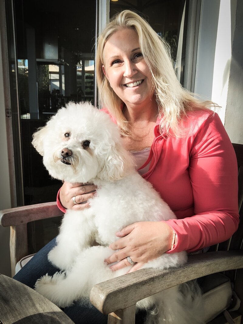 Dog relaxing on the sofa during their stay at Beach House Bliss OC, Orange County